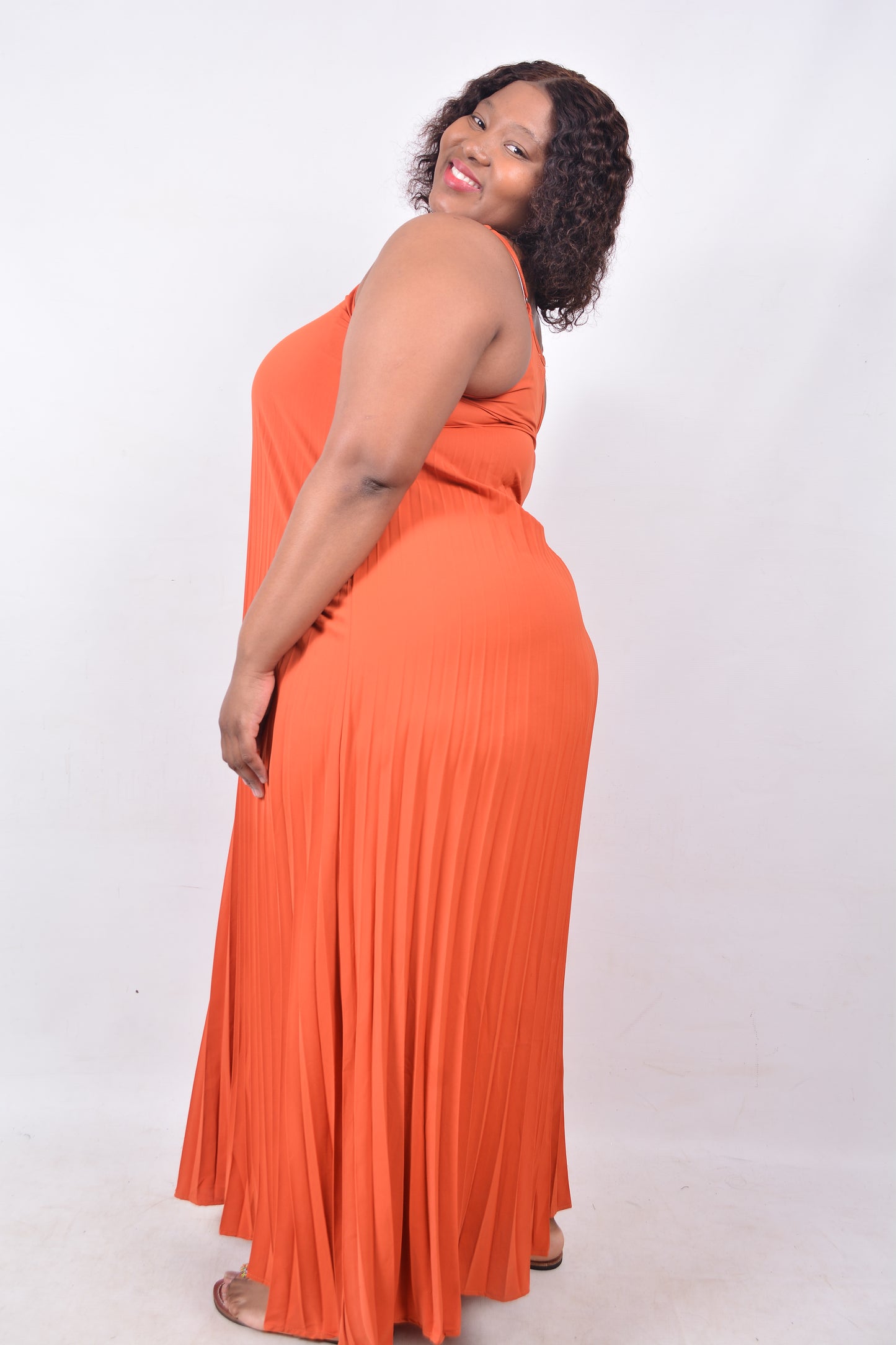 T8254 Ladies Orange Maxi Sleeveless Pleated Dress with adjustable shoulder straps