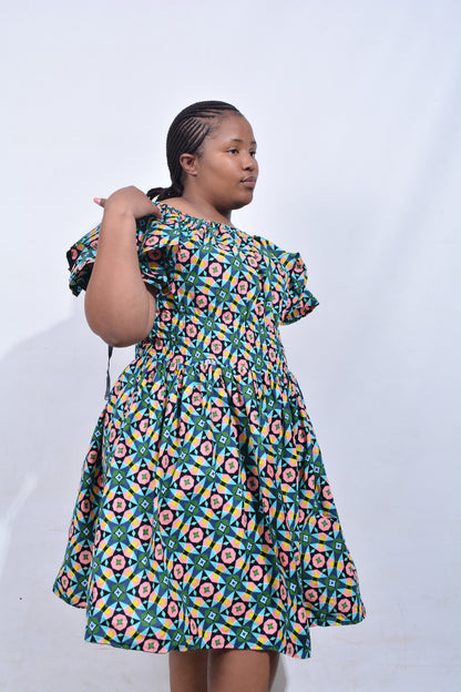 T8203 Traditional African Kente Fabric Green, Pink, Yellow & Black Dress