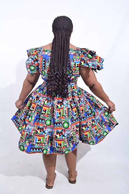 T8206 Traditional African Kente Fabric Green, Blue, Red, Pink, White & Black Dress